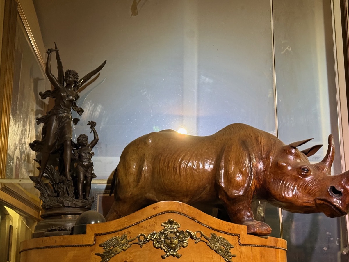 Rhinoceros Sculpture and Winged Figure